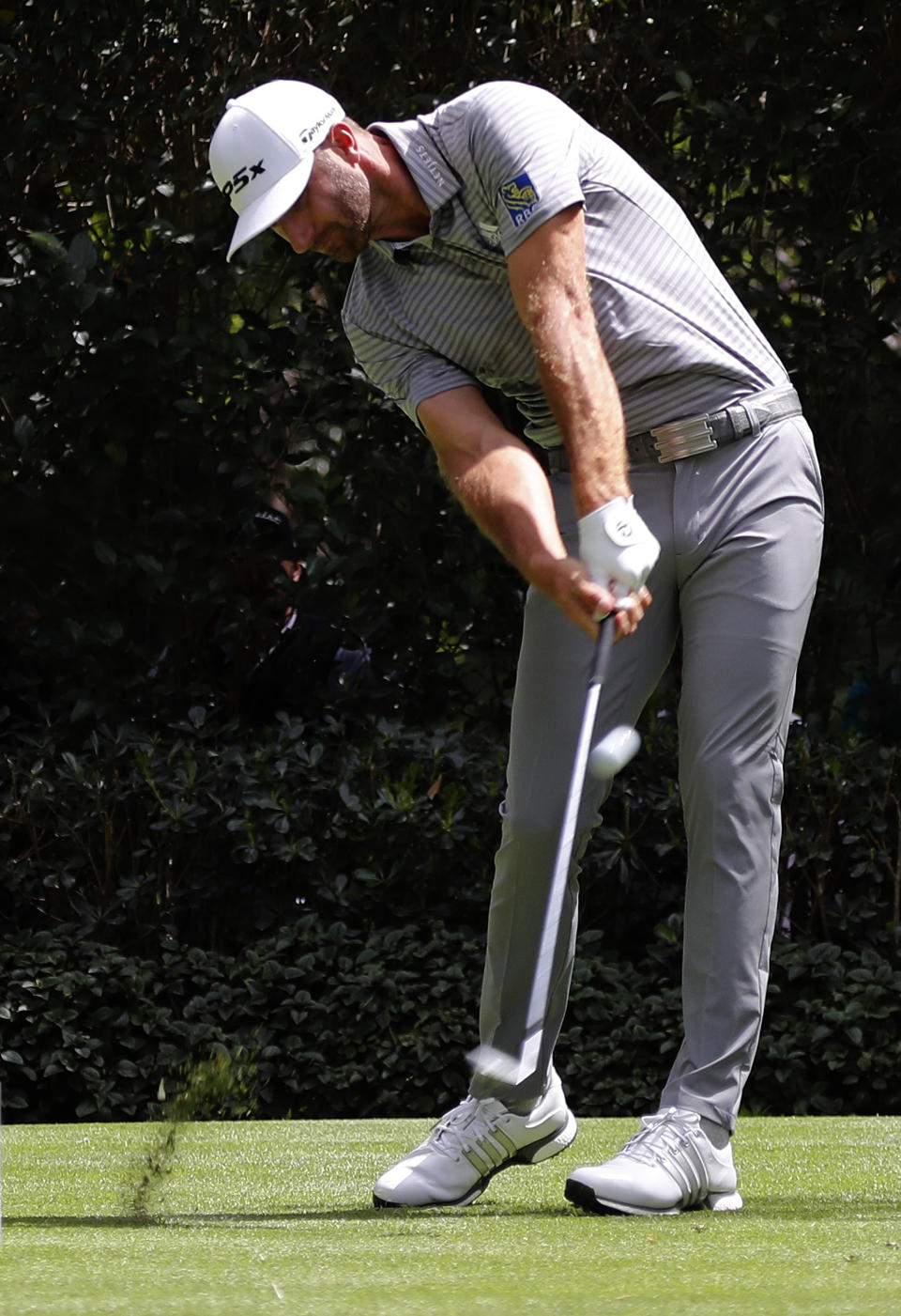 Dustin Johnson hits the ball on the 3rd hole on the second day of competition of the WGC-Mexico Championship at the Chapultepec Golf Club in Mexico City, Friday, Feb. 22, 2019. (AP Photo/Marco Ugarte)