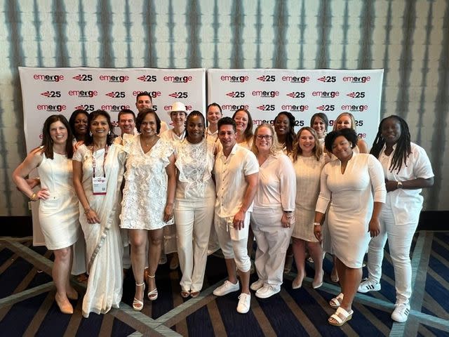 <p>Dow</p> Dow team members at an EMERGE conference, celebrating inclusion, diversity and equity.