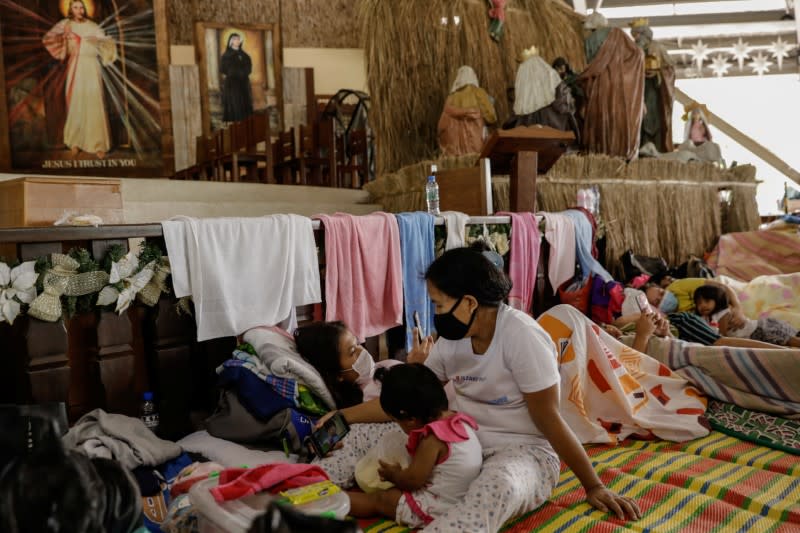 Residents affected by the Taal Volcano eruption rest in Padre Pio Shrine