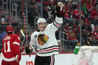 Chicago Blackhawks left wing Dominik Kubalik (8) celebrates his goal against the Detroit Red Wings in the first period of an NHL hockey game Wednesday, Jan. 26, 2022, in Detroit. (AP Photo/Paul Sancya)