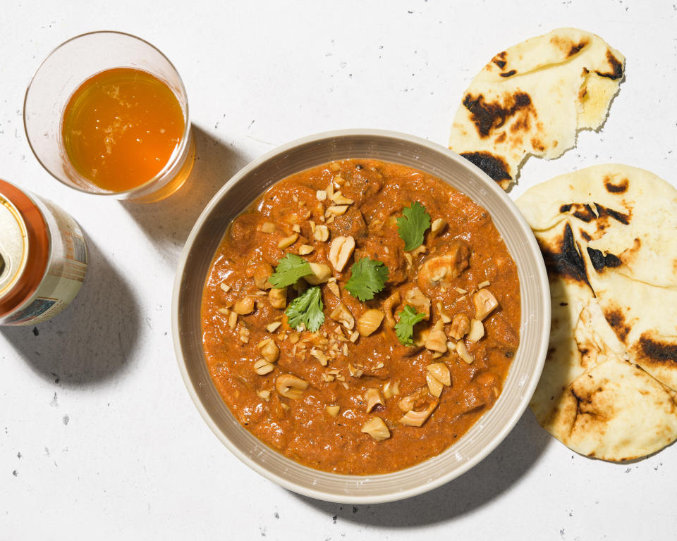 This image released by Milk Street shows a recipe for tomato mushroom curry. (Milk Street via AP)