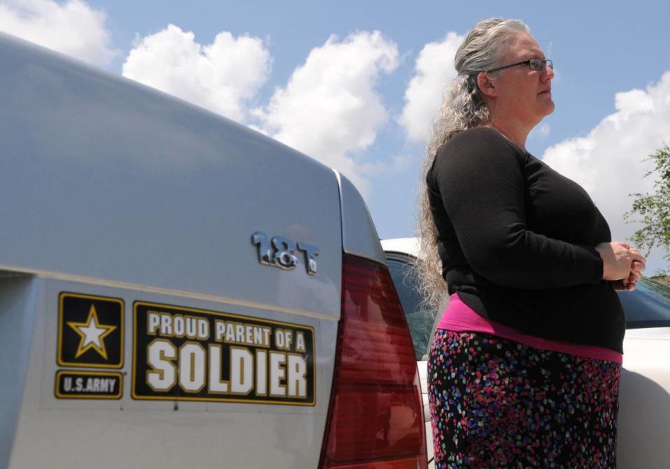 Stefenie Hernandez stands by her car that bears the bumper sticker “Proud parent of a soldier.” Lay’s son, U.S. Army Spc. Patrick Lay, died while serving in Afghanistan.
