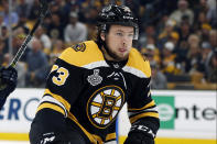 FILE - In this June 6, 2019, file photo, Boston Bruins' Charlie McAvoy (73) skates up the ice during the first period in Game 5 of the NHL hockey Stanley Cup Final game against the St. Louis Blues, in Boston. With NHL training camps set to open this week, roughly a dozen prominent restricted free agents still don’t have contracts, including Tampa Bay’s Brayden Point, Toronto’s Mitch Marner, Boston’s Charlie McAvoy and Brandon Carlo and Colorado’s Mikko Rantanen. Those absences could hang over their teams for days, weeks or even months and have raised questions about why it’s taken so long to get them signed.(AP Photo/Michael Dwyer, File)