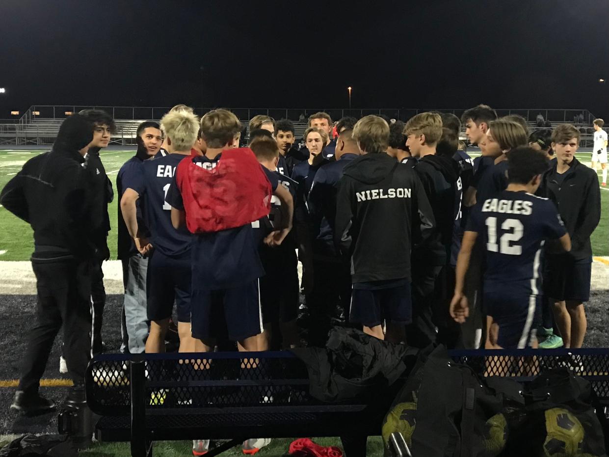 The ALA Gilbert North boys soccer team huddles up at halftime during a 7-2 victory over Valley Christian on Feb. 1, 2022, at ALA Gilbert North.