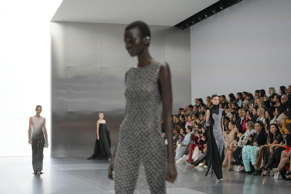 Models wear creations for Fendi as part of the Haute Couture Spring-Summer 2024 collection presented in Paris, Thursday, Jan. 25, 2024. (AP Photo/Thibault Camus)