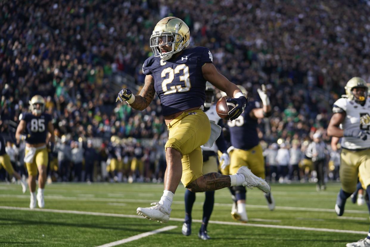 Notre Dame running back Kyren Williams (23) runs during the first half of an NCAA college football game after the game, Saturday, Nov. 20, 2021, in South Bend, Ind. (AP Photo/Darron Cummings)