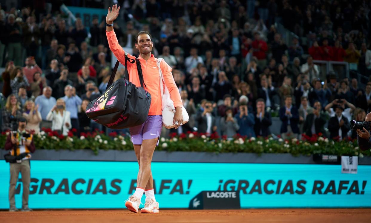 <span>Rafael Nadal waves goodbye to fans after a special presentation to celebrate his five career titles in Madrid.</span><span>Photograph: Quality Sport Images/Getty Images</span>