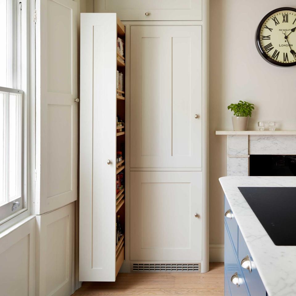 pull larder in full height a cream kitchen unit