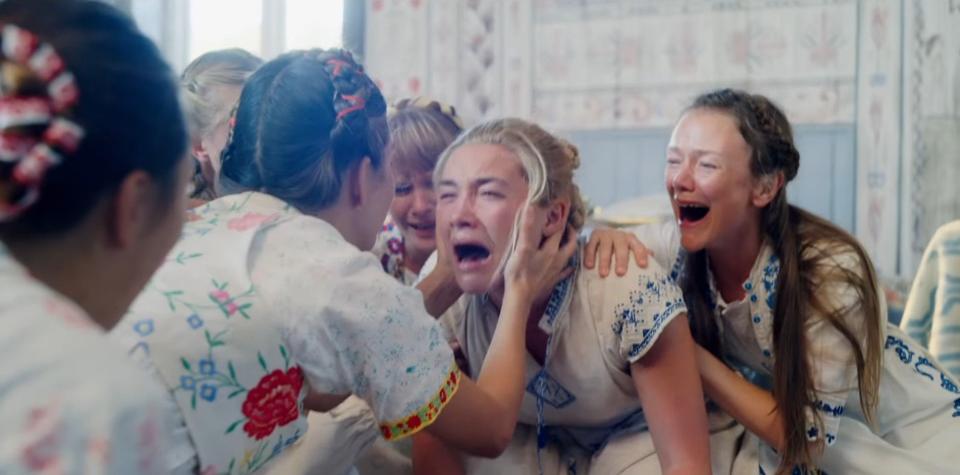 Dani crying with many other women in "Midsommar"