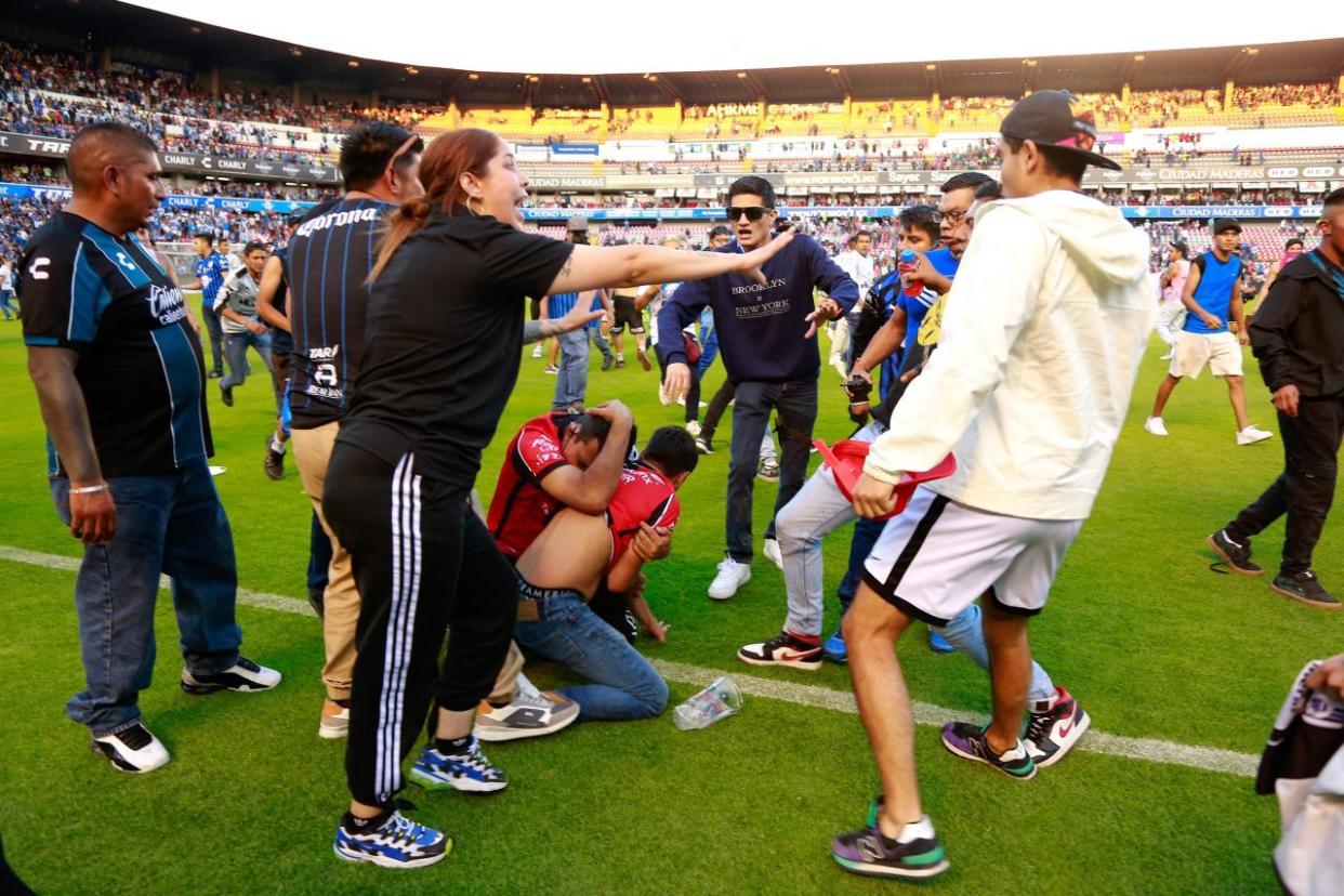 Bronca en el partido Querétaro vs Atlas  | Foto: Cuartoscuro