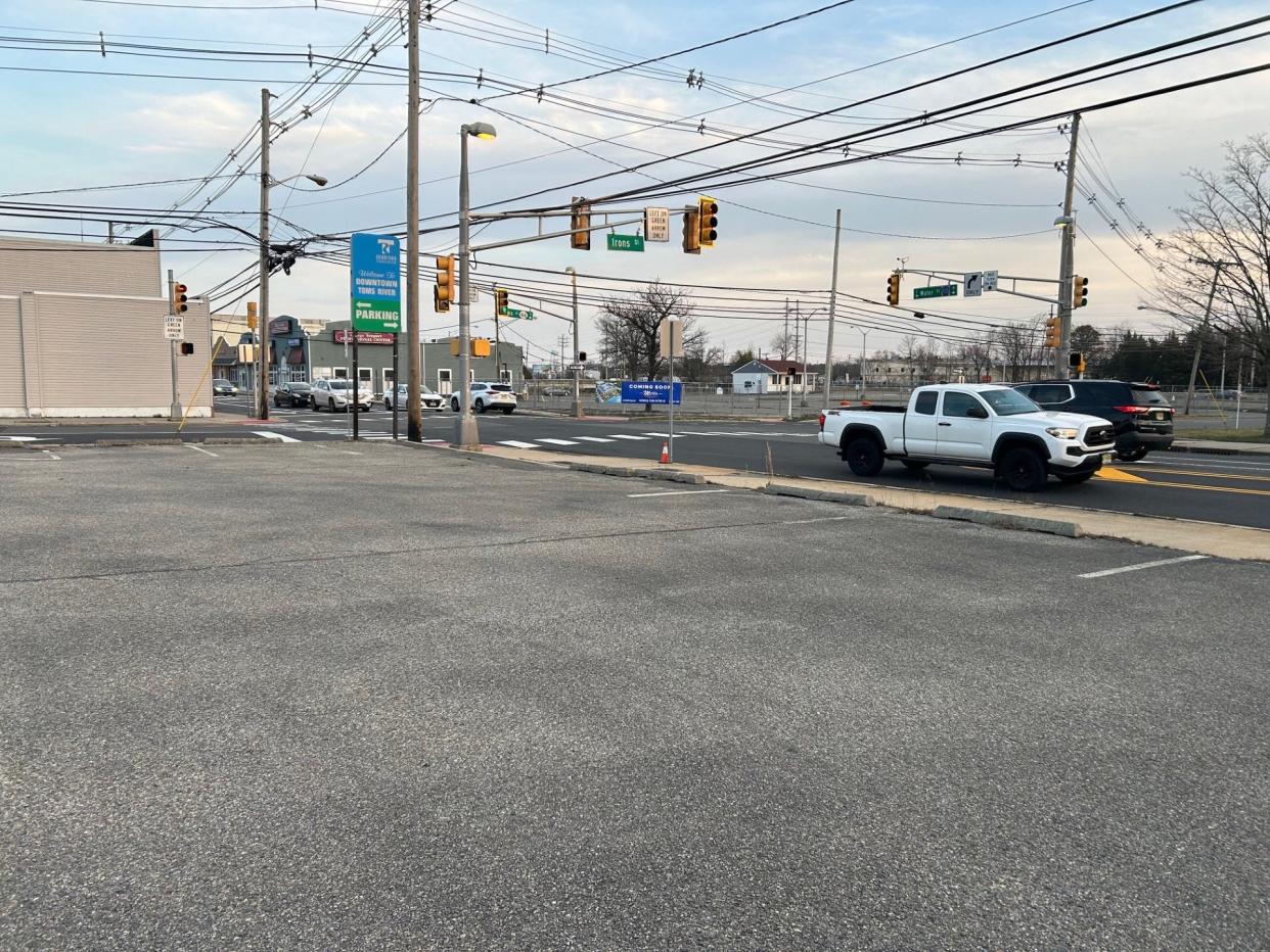 A four-story building with 64 residences and commercial space is proposed for this parking lot at the corner of West Water and Irons streets in Toms River.
