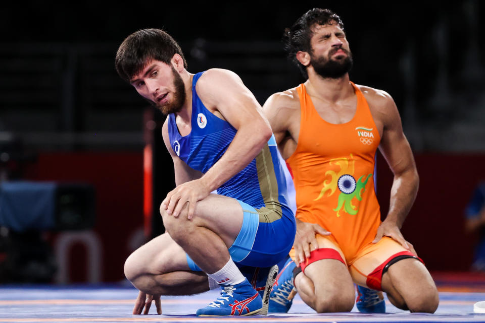 CHIBA, JAPAN - AUGUST 5, 2021: Indias Kumar Ravi (R) and ROC's Zaur Uguev in the men's freestyle 57kg final wrestling bout at the 2020 Summer Olympic Games, at the Makuhari Messe convention center. Stanislav Krasilnikov/TASS (Photo by Stanislav Krasilnikov\TASS via Getty Images)