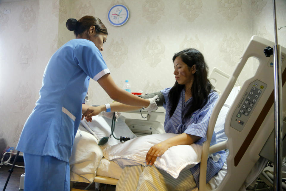 Indian climber Ameesha Chauhan who survived dangerous overcrowding on Mount Everest gets treatment at a hospital after she was rescued in Kathmandu, Nepal, on Tuesday. (Photo: ASSOCIATED PRESS)