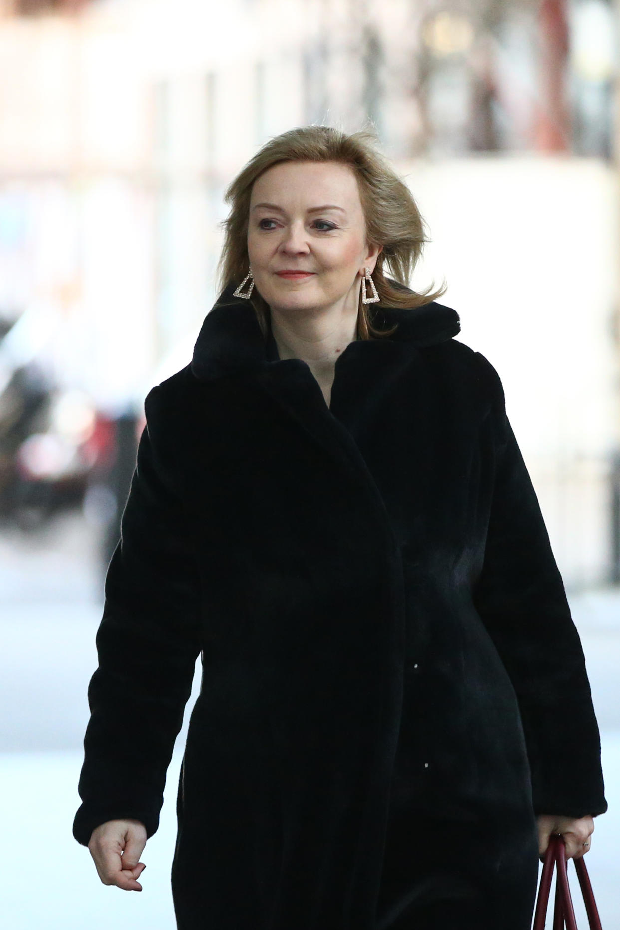 LONDON, ENGLAND - JANUARY 30: Foreign Secretary Liz Truss arrives at BBC Broadcasting House ahead of her appearance on Sunday Morning on January 30, 2022 in London, England. Sophie Raworth, the veteran BBC journalist, is serving as the interim host of the Sunday morning political programme after the departure of Andrew Marr last month. (Photo by Hollie Adams/Getty Images)