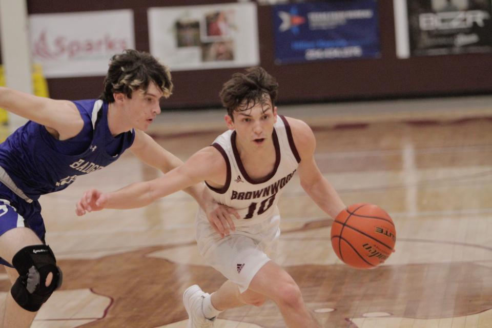 Brownwood's Jakob Hataway dribbles to the paint against Lampasas.