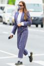 <p><strong>May 2021</strong> Another statement suit moment for Irina Shayk, this time in a purple pinstripe. </p>
