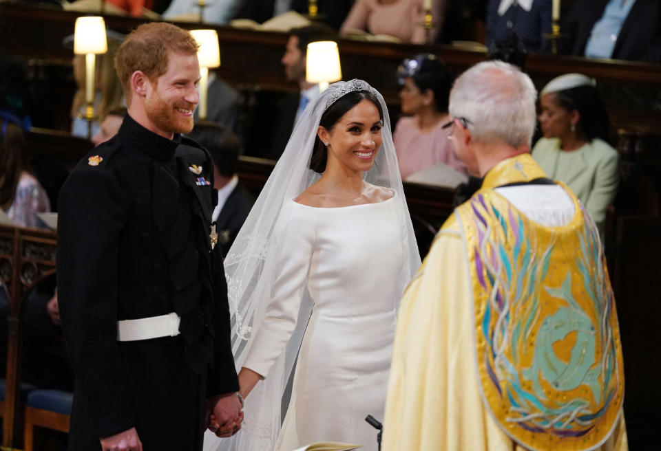 Prince Harry and Meghan Markle during their wedding service, conducted by the Archbishop of Canterbury Justin Welby in St George's Chapel at Windsor Castle on May 19, 2018 in Windsor, England