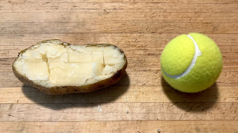 Baked potato and tennis ball