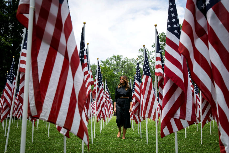 U.S. first lady Melania Trump visits a field of American flags, each flag representing a child in the foster system in Cabell County, WV, most of them due to the opioid crisis, at Ritter Park in Huntington, W.V., U.S., July 8, 2019. REUTERS/Al Drago     TPX IMAGES OF THE DAY