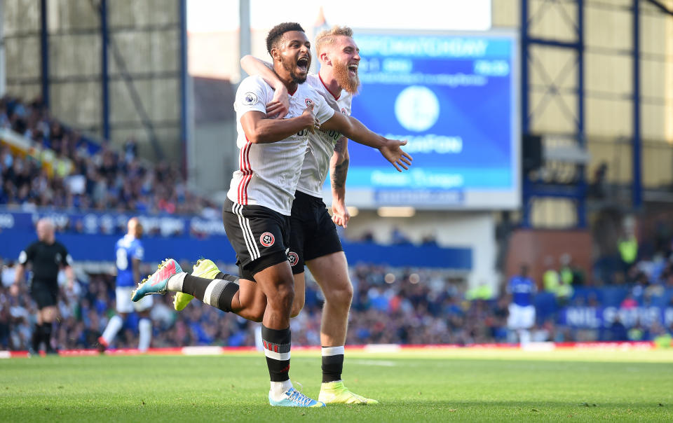 LIVERPOOL, ENGLAND - SEPTEMBER 21:  Lys Mousset of Sheffield United celebrates after scoring his team's second goal with Oliver McBurnie  during the Premier League match between Everton FC and Sheffield United at Goodison Park on September 21, 2019 in Liverpool, United Kingdom. (Photo by Nathan Stirk/Getty Images)