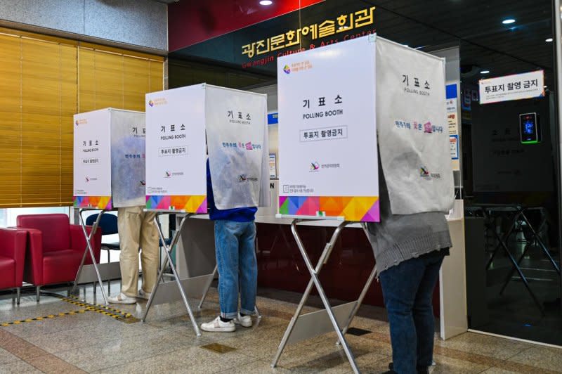 Voters turned out in high numbers to vote in South Korea's parliamentary elections on Wednesday, with the opposition Democratic Party projected to score a landslide victory. Photo by Thomas Maresca/UPI