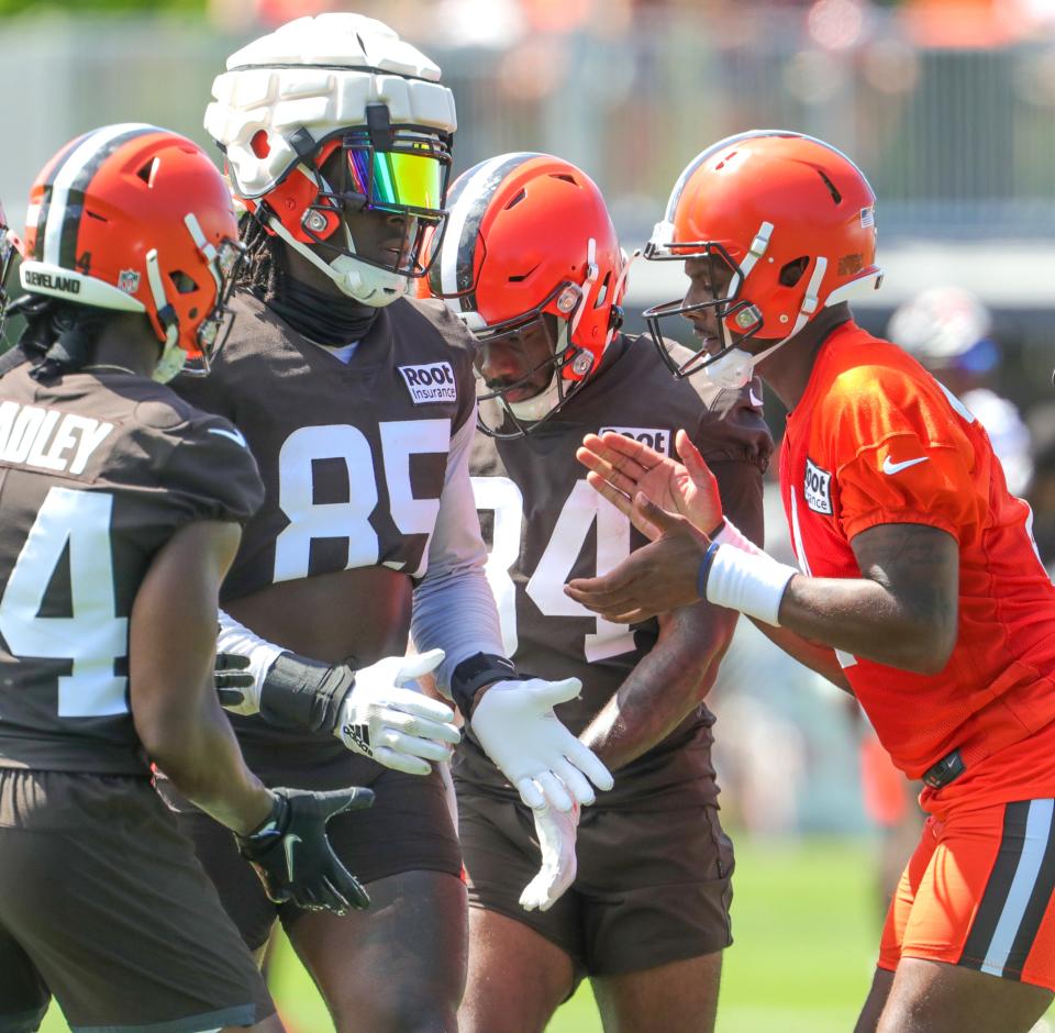 Cleveland Browns quarterback Deshaun Watson calls a play in the huddle during training camp on Saturday, July 30, 2022 in Berea.