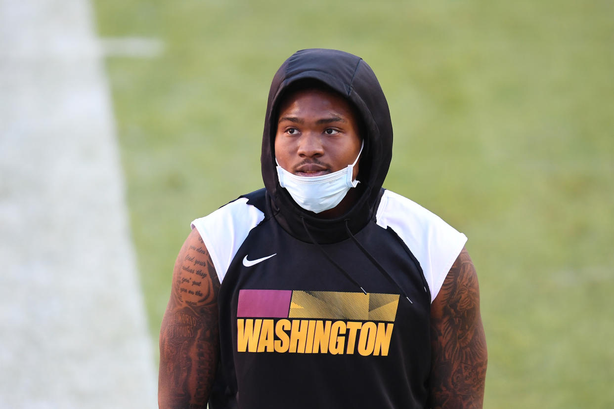 LANDOVER, MARYLAND - DECEMBER 27: Dwayne Haskins #7 of the Washington Football Team looks on prio at FedExField on December 27, 2020 in Landover, Maryland. (Photo by Will Newton/Getty Images)