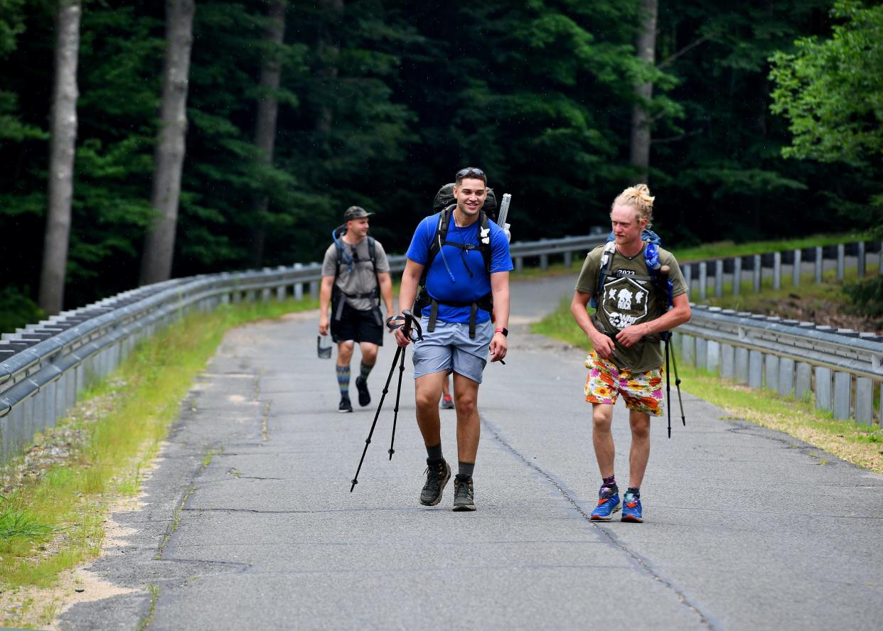 Toby Belton of Gardner, left, and Dillan Skamarycz of Westminster arrive at the Barre Falls Dam in Hubbardston.