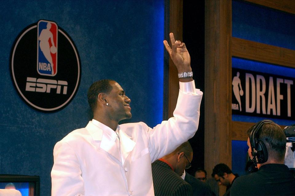 LeBron James gestures during the 2003 NBA Draft on June 26, 2003, in New York.