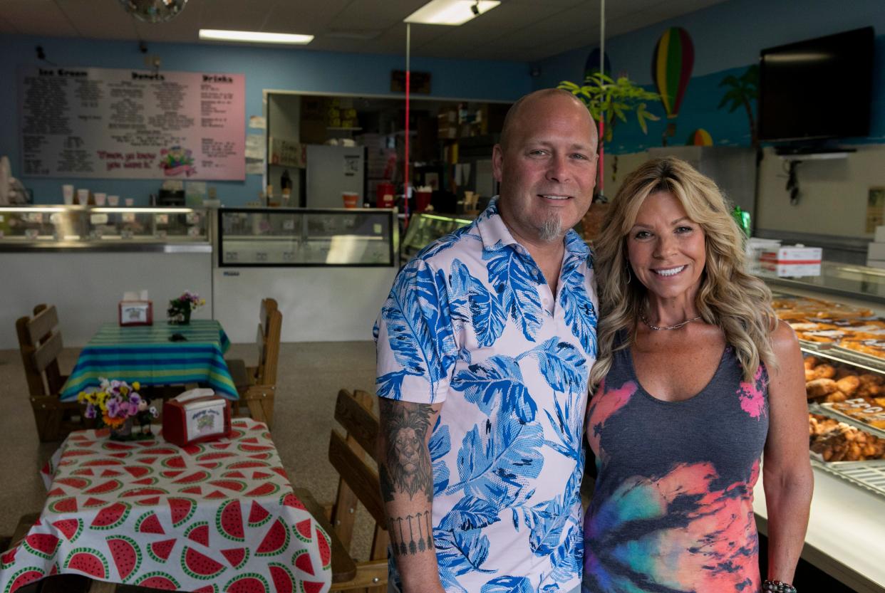 Owners Joe and Beth Bellmer stand inside of Gypsy Joe's Ice Cream on August 14, 2023, in Lancaster, Ohio.