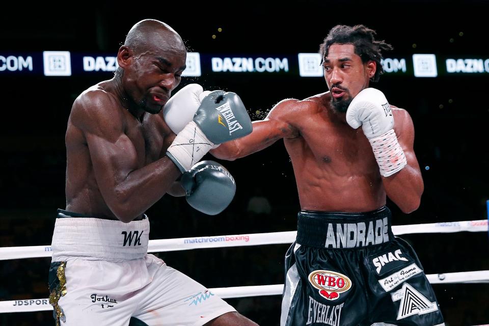 Demetrius Andrade lands a right on Walter Kautondokwa during a WBO middleweight championship boxing match in Boston, Sunday, Oct. 21, 2018. (AP Photo/Michael Dwyer)