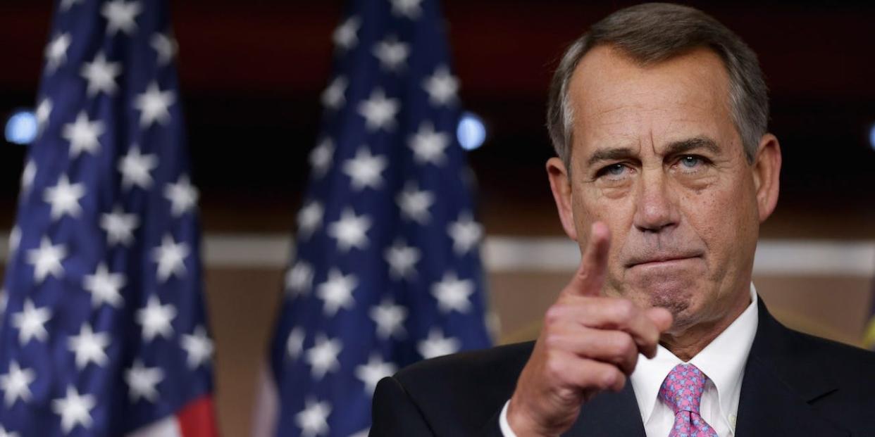 Speaker of the House John Boehner (R-OH) answers reporters questions during his weekly news conference in the Capitol Visitors Center at the U.S. Capitol December 5, 2013.