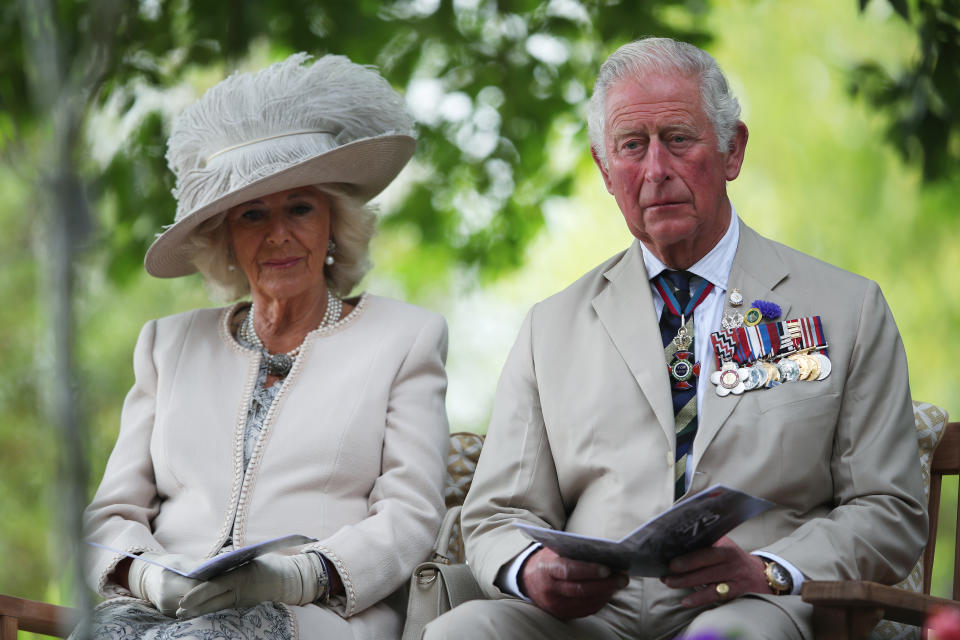 Britain's Prince Charles and Camilla, Duchess of Cornwall attend the VJ Day National Remembrance event, held at the National Memorial Arboretum in Staffordshire, Britain August 15, 2020.