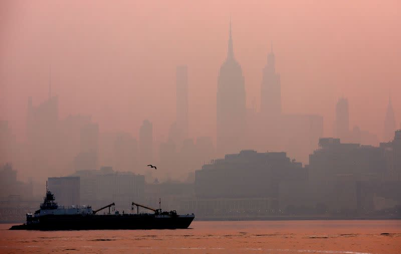Haze and smoke shrouds Manhattan skyline from Canadian wildfires in New York