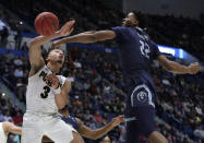 Old Dominion's Kalu Ezikpe (22) blocks a shot by Purdue's Carsen Edwards (3) during the first half of a first round men's college basketball game in the NCAA Tournament, Thursday, March 21, 2019, in Hartford, Conn. (AP Photo/Elise Amendola)