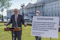 Senate Minority Leader Chuck Schumer, D-N.Y., joined by Sen. Dick Durbin, D-Ill., right, holds a press briefing on the Supreme Court vacancy created by the death of Justice Ruth Bader Ginsburg, outside the Capitol in Washington, Tuesday, Sept. 22, 2020. (AP Photo/J. Scott Applewhite)