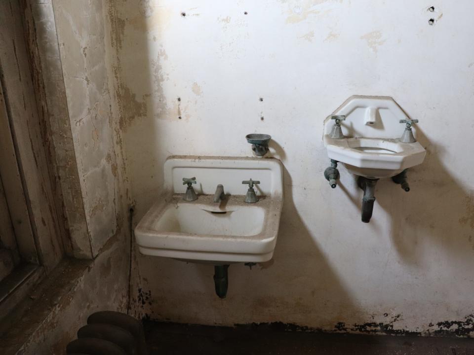 two sinks next to each other at the ellis island hospital