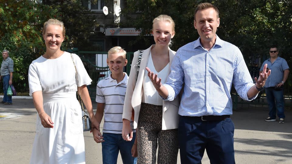 Navalny, right walks with his family to a polling station during the Moscow city Duma elections in 2019. - Vasily Maximov/AFP/Getty Images