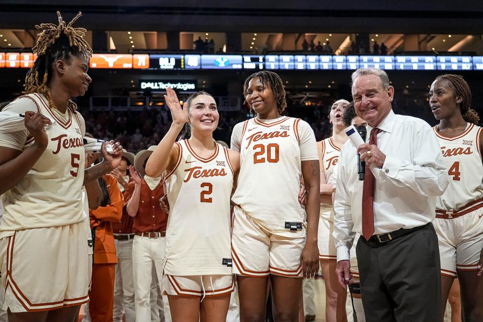 Texas guard Shaylee Gonzales, left, and forward Khadija Faye are celebrated on Senior Night after their final regular-season home game at Moody Center on Saturday. Both players have spent the past two seasons at Texas after transferring in.