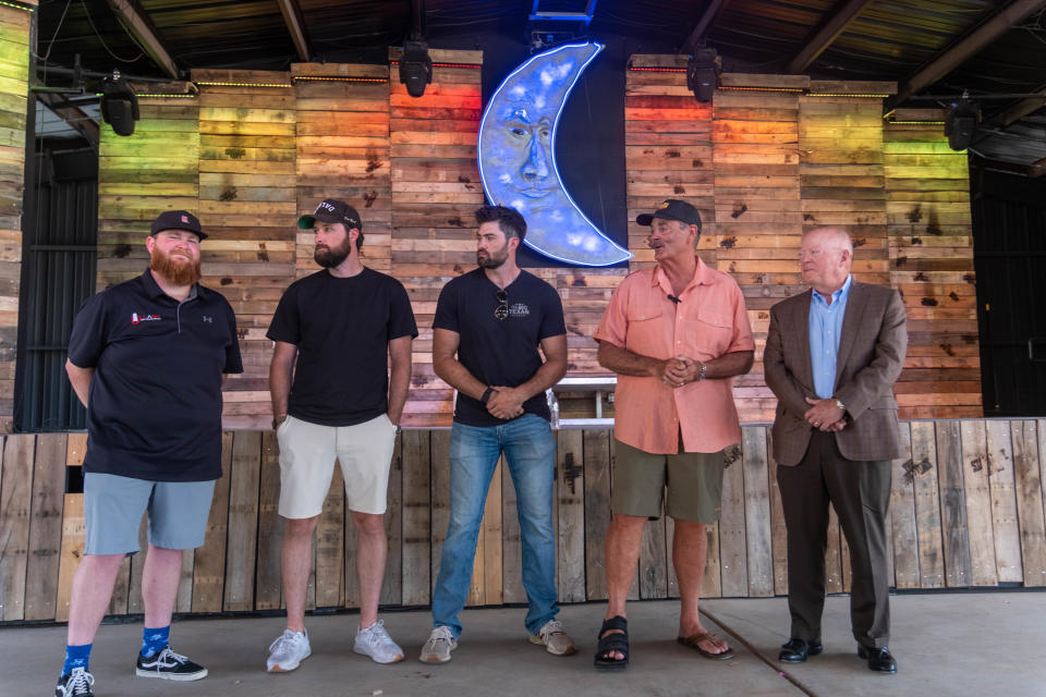 Starlight Ranch co-owner Bobby Lee stands with his Interstate Bank CEO Danny Skarba Wednesday  to announce a fundraiser to help the victims of Perryton in Amarillo.