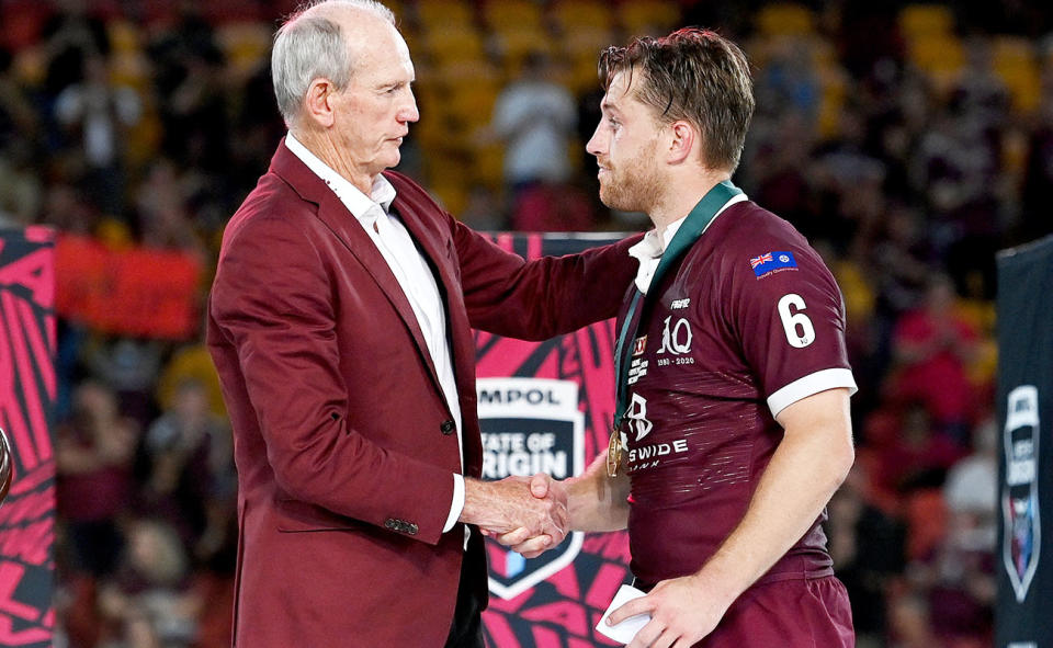 Wayne Bennett and Cameron Munster, pictured here after State of Origin Game III in 2020.