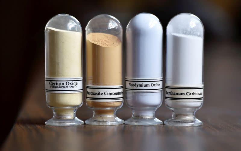 FILE PHOTO: Samples of rare earth minerals, Cerium oxide, Bastnasite, Neodymium oxide and Lanthanum carbonate are on display during a tour of Molycorp's Mountain Pass Rare Earth facility in Mountain Pass, California