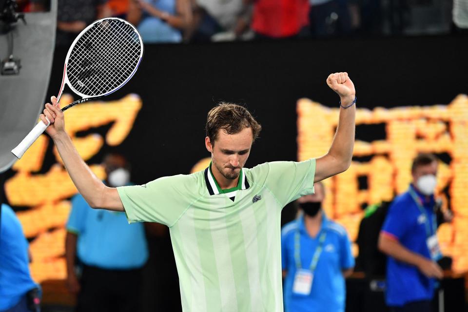 Russia&#39;s Daniil Medvedev celebrates after beating Canada&#39;s Felix Auger-Aliassime in their men&#39;s singles quarter-final match at the Australian Open tennis tournament in Melbourne on January 27, 2022. - -- IMAGE RESTRICTED TO EDITORIAL USE - STRICTLY NO COMMERCIAL USE -- (Photo by Paul Crock / AFP) / -- IMAGE RESTRICTED TO EDITORIAL USE - STRICTLY NO COMMERCIAL USE -- (Photo by PAUL CROCK/AFP via Getty Images)