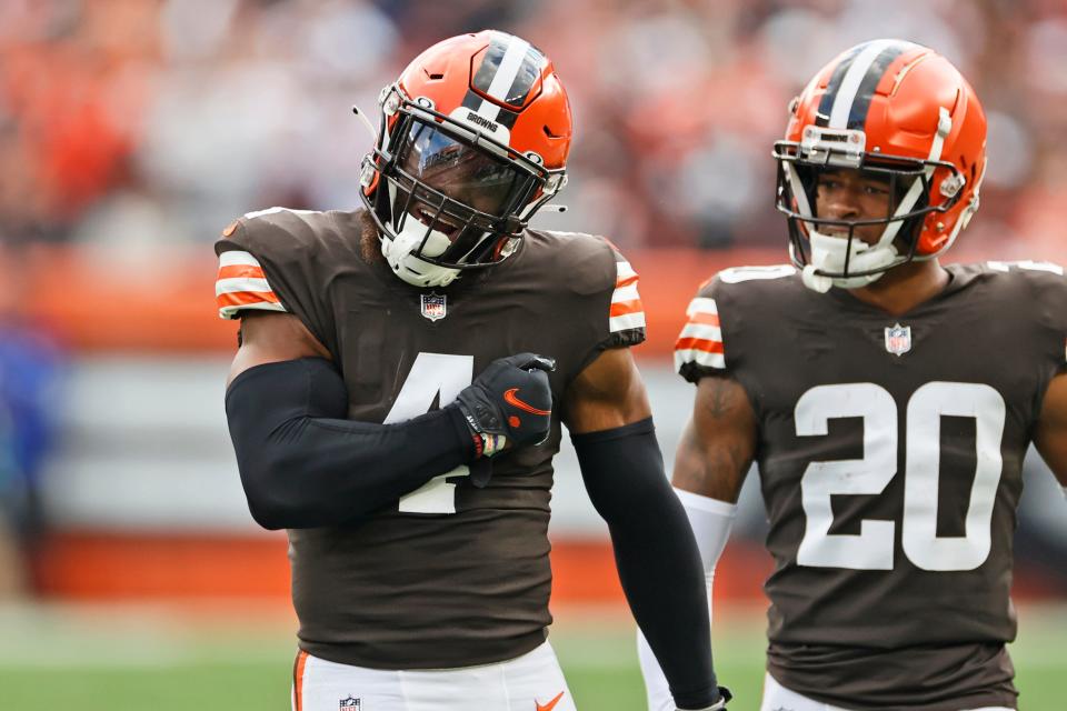 Cleveland Browns middle linebacker Anthony Walker (4) celebrates a tackle during the first half of an NFL football game against the Arizona Cardinals, Sunday, Oct. 17, 2021, in Cleveland. (AP Photo/Ron Schwane)