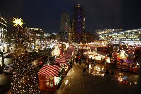 Picture shows the re-opened Christmas market at Breitscheid square. REUTERS/Fabrizio Bensch