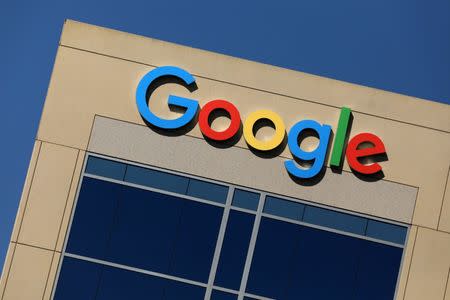 FILE PHOTO: The Google logo is pictured atop an office building in Irvine, California, U.S. August 7, 2017. REUTERS/Mike Blake/File Photo