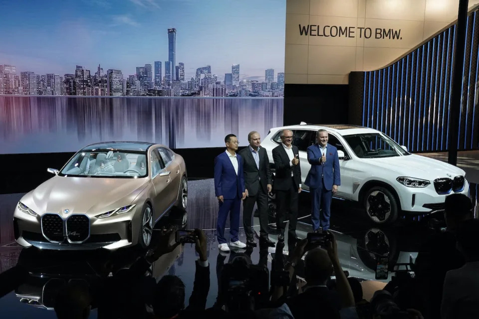 BMW executives in Beijing at the unveiling of new electric luxury cars at the Auto China 2020 show. <a href="https://newsroom.ap.org/detail/ChinaAutoShow/eb8a28a5b1dd4ccab749f96838714635/photo?Query=car%20show%20China%202020&mediaType=photo&sortBy=&dateRange=Anytime&totalCount=31&currentItemNo=5" rel="nofollow noopener" target="_blank" data-ylk="slk:AP Photo/Ng Han Guan;elm:context_link;itc:0" class="link rapid-noclick-resp">AP Photo/Ng Han Guan</a>