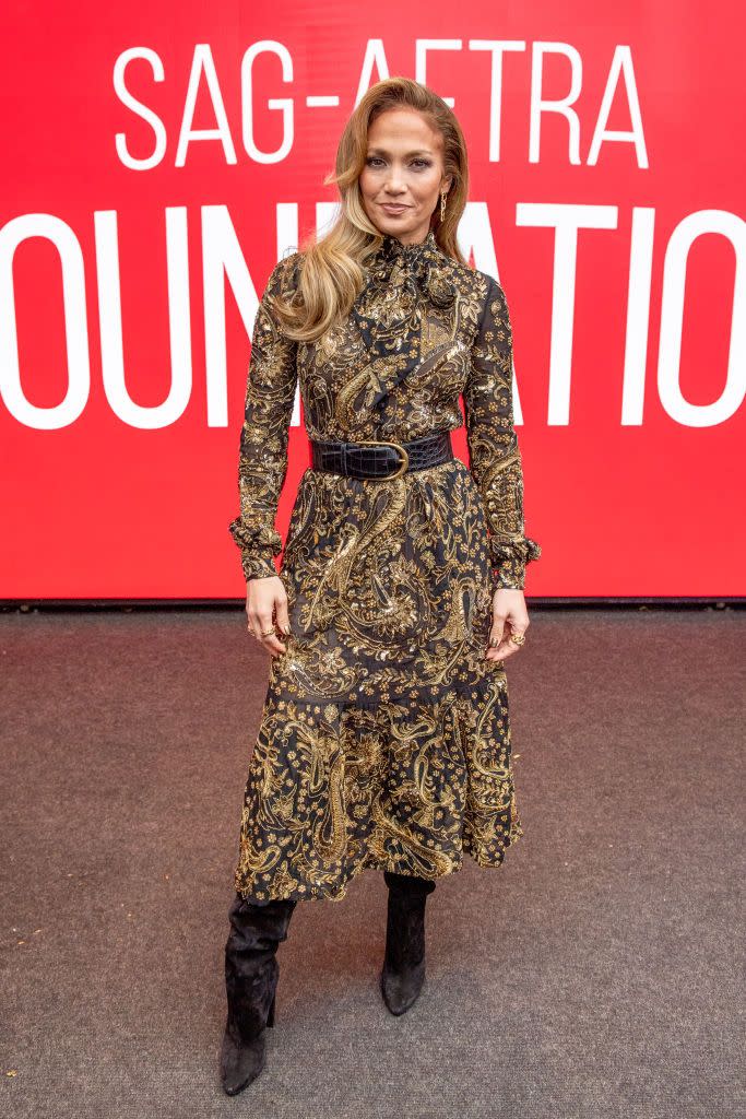 <p>Attending a SAG conversation event for Hustlers, Lopez wore a paisley-print YSL ruffled midi dress.</p>