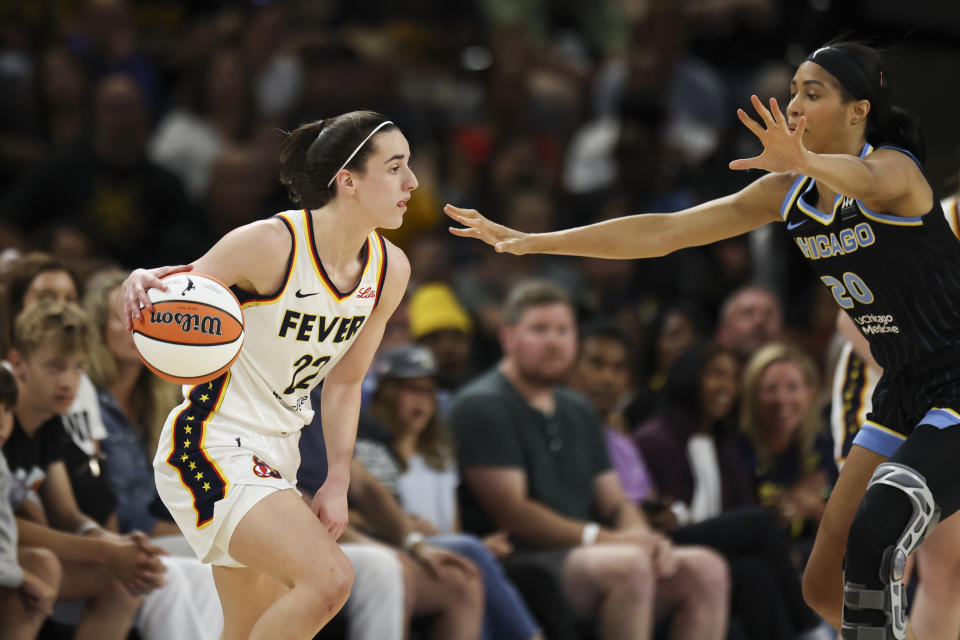 Chicago Sky forward Isabelle Harrison (20) guards Indiana Fever guard Caitlin Clark (22) during a WNBA basketball game, Sunday, June 23, 2024, in Chicago. (Eileen T. Meslar/Chicago Tribune via AP)