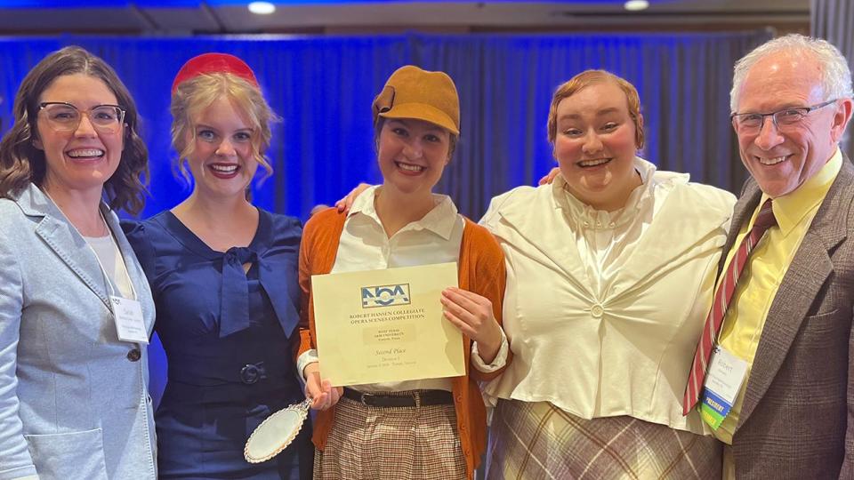 West Texas A&M University students Sarah Estes, second from left, Erin Hinds and Brooklynn King won second-place honors at the National Opera Association’s Robert Hansen Collegiate Opera Scenes Competition on Jan. 4. Also pictured are Sarah Beckham-Turner, left, assistant professor of voice and WT Opera director; and Dr. Robert Hansen, WT's Regents Professor of Music.